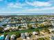 Wide aerial view of waterfront homes and canals at 3215 Rose Arbor Dr, Hernando Beach, FL 34607