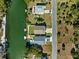 Aerial view of waterfront home and neighborhood at 3215 Rose Arbor Dr, Hernando Beach, FL 34607