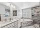 Elegant bathroom with double vanity, soaking tub, and shower at 3215 Rose Arbor Dr, Hernando Beach, FL 34607