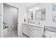 Bathroom with double vanity, and separate toilet area at 3215 Rose Arbor Dr, Hernando Beach, FL 34607