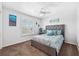 Guest bedroom with a queen-size bed and beach decor at 3215 Rose Arbor Dr, Hernando Beach, FL 34607