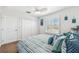 Bright bedroom with a comfortable bed, and plenty of closet space at 3215 Rose Arbor Dr, Hernando Beach, FL 34607