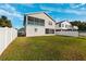 Two-story home with fenced yard and canal access at 3215 Rose Arbor Dr, Hernando Beach, FL 34607