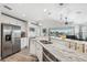 Modern kitchen featuring stainless steel appliances and an island at 3215 Rose Arbor Dr, Hernando Beach, FL 34607