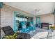 Relaxing screened porch with water views and outdoor grill at 3215 Rose Arbor Dr, Hernando Beach, FL 34607