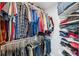Large walk-in closet with ample shelving and hanging space at 3215 Rose Arbor Dr, Hernando Beach, FL 34607