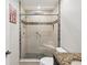Updated bathroom with a walk-in shower and granite countertop at 3259 Hilary Cir # 1C, Palm Harbor, FL 34684