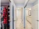 Hall bathroom with double sinks and access to the closet at 3259 Hilary Cir # 1C, Palm Harbor, FL 34684