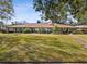 Attractive triplex with well-maintained landscaping and curb appeal at 3259 Hilary Cir # 1C, Palm Harbor, FL 34684