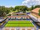 Community shuffleboard courts with covered seating at 3259 Hilary Cir # 1C, Palm Harbor, FL 34684