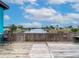 Wooden deck with water view and seating area at 3265 Gardenia Dr, Hernando Beach, FL 34607