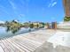 Spacious wooden dock overlooking the water at 3265 Gardenia Dr, Hernando Beach, FL 34607