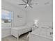 Bedroom with two twin beds, nightstand and window at 3338 Poinsettia Dr, Hernando Beach, FL 34607