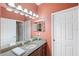 Bathroom with granite countertop, sink, and shower at 3414 Graycliff Ln, Brandon, FL 33511
