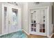 Elegant entryway with stained glass door and access to office at 3414 Graycliff Ln, Brandon, FL 33511