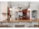 Kitchen features a breakfast bar with granite countertops at 3414 Graycliff Ln, Brandon, FL 33511