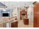 Island kitchen with stainless steel appliances and granite countertops at 3414 Graycliff Ln, Brandon, FL 33511