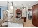 Kitchen features granite island, stainless steel appliances, and ample cabinet space at 3414 Graycliff Ln, Brandon, FL 33511