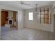 Dining area with tile floors, built-in shelving and fireplace at 3419 Van Nuys Loop, New Port Richey, FL 34655