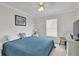 Spacious bedroom featuring a large bed and window coverings at 4332 Lamson Ave, Spring Hill, FL 34608