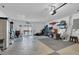 Garage with storage and access to backyard at 4332 Lamson Ave, Spring Hill, FL 34608