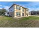Two-story house exterior with landscaping and a two-car garage at 4332 Lamson Ave, Spring Hill, FL 34608