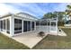 Screened patio with fire pit and adjacent to the pool area at 4332 Lamson Ave, Spring Hill, FL 34608