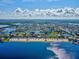 Wide aerial view of waterfront homes and canals at 4430 Floramar Ter, New Port Richey, FL 34652