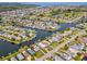 Aerial view showing home's location in a waterfront community at 4430 Floramar Ter, New Port Richey, FL 34652