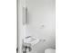 Small bathroom with corner sink and updated mirror at 4430 Floramar Ter, New Port Richey, FL 34652