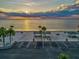 Beachfront gazebos at sunset with parking at 4430 Floramar Ter, New Port Richey, FL 34652
