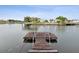 Wooden dock on calm water at 4430 Floramar Ter, New Port Richey, FL 34652