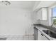 Kitchen boasts granite countertops and stainless steel appliances at 4430 Floramar Ter, New Port Richey, FL 34652