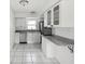 Kitchen with granite countertops and stainless steel appliances at 4430 Floramar Ter, New Port Richey, FL 34652