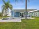 Backyard patio with firepit and seating at 4430 Floramar Ter, New Port Richey, FL 34652