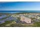 Expansive waterfront view of condo building and marina at 4516 Seagull Dr # 417, New Port Richey, FL 34652