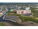 Aerial view of waterfront condo building with parking and boat slips at 4516 Seagull Dr # 417, New Port Richey, FL 34652