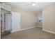 Spacious bedroom with carpeted floor and large window at 4516 Seagull Dr # 417, New Port Richey, FL 34652