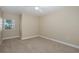 Bright bedroom featuring carpeted floors and a ceiling fan at 4516 Seagull Dr # 417, New Port Richey, FL 34652