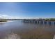 Community boat dock with clear water views at 4516 Seagull Dr # 417, New Port Richey, FL 34652
