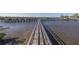 Wooden walkway leads to a boat dock at 4516 Seagull Dr # 417, New Port Richey, FL 34652