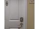 White condo entrance door with keyless entry at 4516 Seagull Dr # 417, New Port Richey, FL 34652