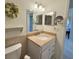 Bathroom with granite countertop, toilet and sink at 4620 Bay Blvd # 1158, Port Richey, FL 34668
