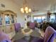 Elegant dining area with glass top table and water view at 4620 Bay Blvd # 1158, Port Richey, FL 34668