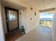 Condo entryway with ocean view and balcony access at 4620 Bay Blvd # 1158, Port Richey, FL 34668