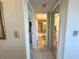 Bright hallway with access to bathroom and other rooms at 4620 Bay Blvd # 1158, Port Richey, FL 34668