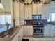 Spacious kitchen with granite countertops and stainless steel appliances at 4620 Bay Blvd # 1158, Port Richey, FL 34668