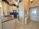 Kitchen with granite countertops and white cabinets at 4620 Bay Blvd # 1158, Port Richey, FL 34668