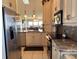 Modern kitchen with stainless steel appliances and granite counters at 4620 Bay Blvd # 1158, Port Richey, FL 34668