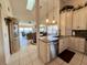Kitchen with granite countertops, island, and ocean view at 4620 Bay Blvd # 1158, Port Richey, FL 34668